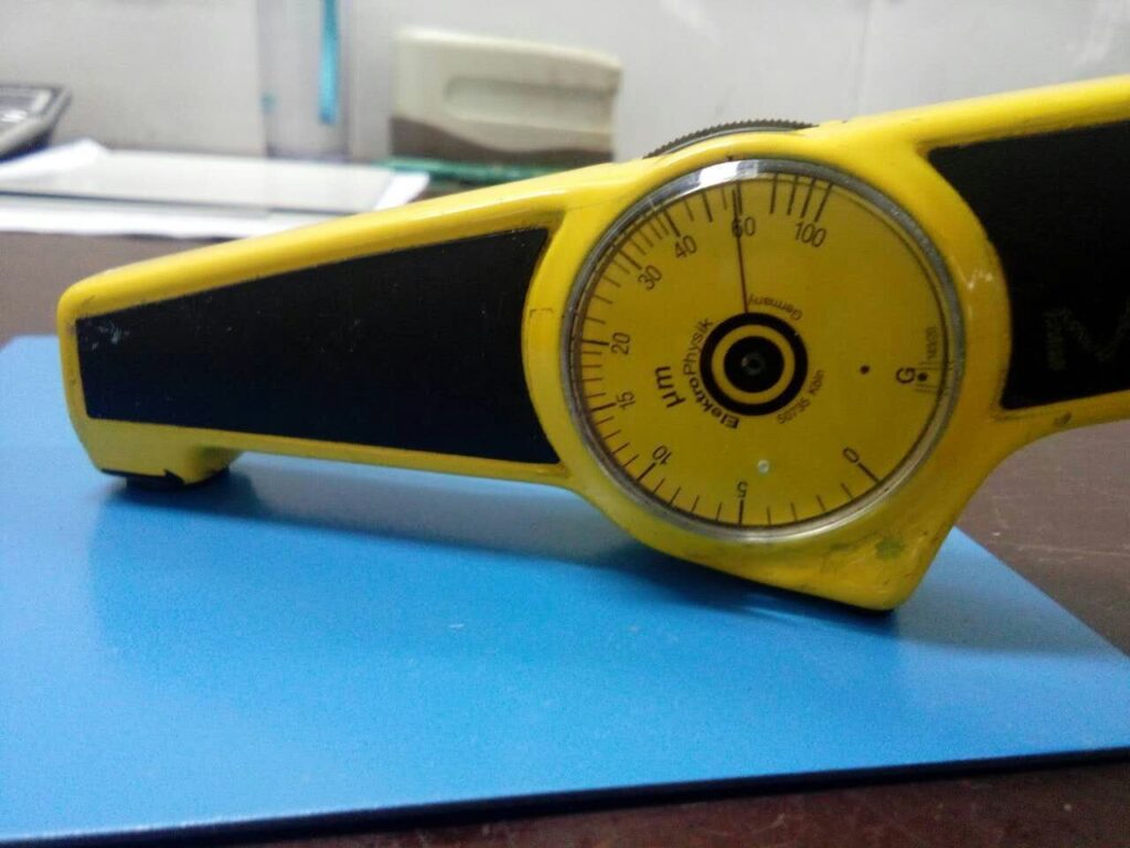 Measuring coating thickness on prepainted metal surface