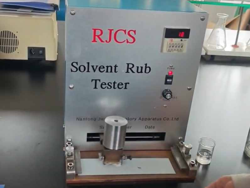 MEK solvent rub test for coating resistance on metal panel