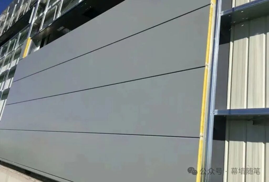 Sandwich panel wall system for industrial building facade