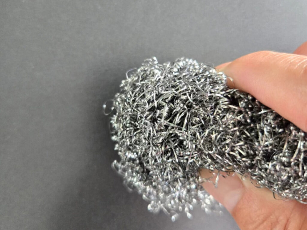 Scratch resistance test using steel wool on coated metal panel