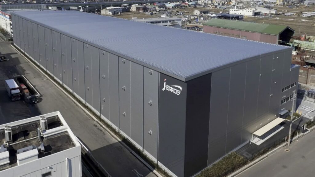 Industrial warehouse building with prepainted metal wall cladding system for large-scale exterior application
