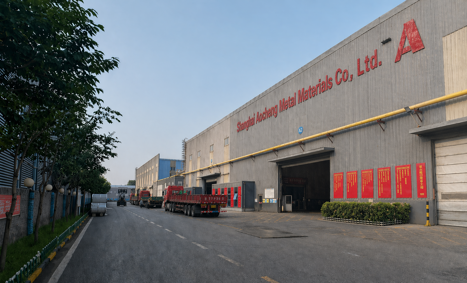Shanghai Aocheng Metal factory exterior with prepainted aluminum coil production and loading area