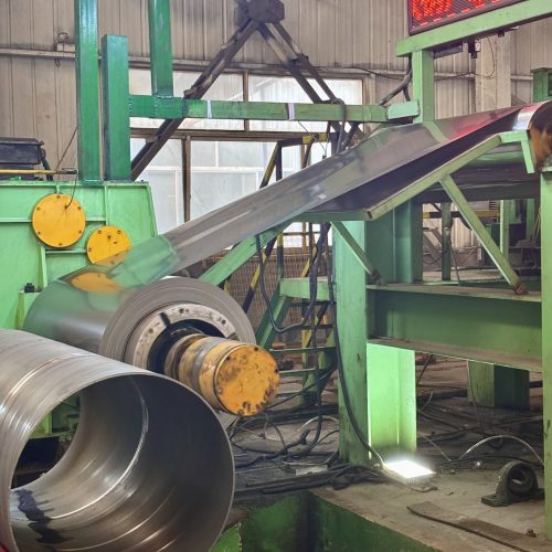 Aluminum coil uncoiling process on production line for coating and further processing