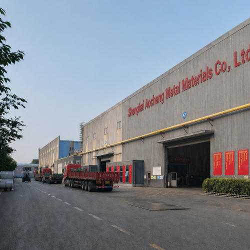 Shanghai Aocheng Metal factory exterior with prepainted aluminum coil production and loading area